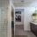 a bathroom with a glass door