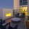 a patio with chairs and a table
