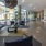 lobby with large windows and a chandelier
