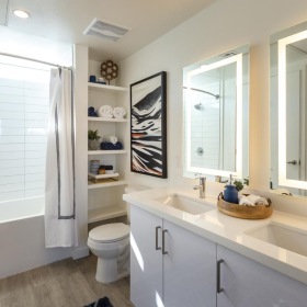 Bathroom options with thoughtful details a bathroom with a tub sink and toilet